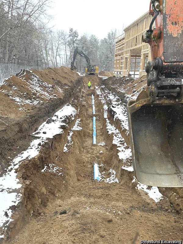 Water line trenches and placement of piping.